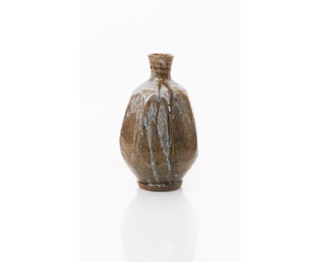 William Bill Marshall (1923-2007) a Leach Pottery cut-sided stoneware bottle vase, covered to the foot in an ash glaze, the s