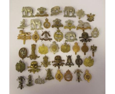 Approx. forty British military cap badges, some copies: to include XII Royal Lancers, First Life Guards, 3rd Dragoon Guards a