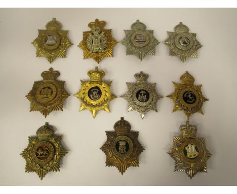 Ten regimental helmet plates, some copies: to include Devonshire &amp; Dorset, South Lancaster and Somerset Light Infantry (P