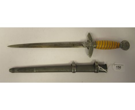 A German Third Reich era Luftwaffe Officer's 2nd pattern dress dagger with cast aluminium mounts, a wreathed Swastika pommel,