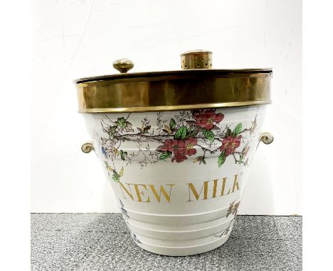 A 19th C ceramic milk pail with a brass cover.