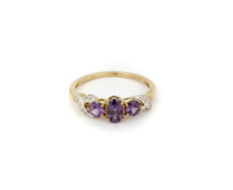 A 9ct yellow gold tourmaline and diamond set ring, (O).