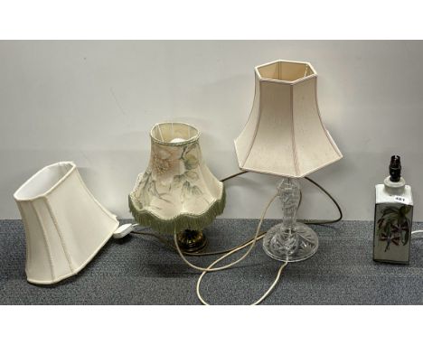 A cut crystal table lamp and two others.