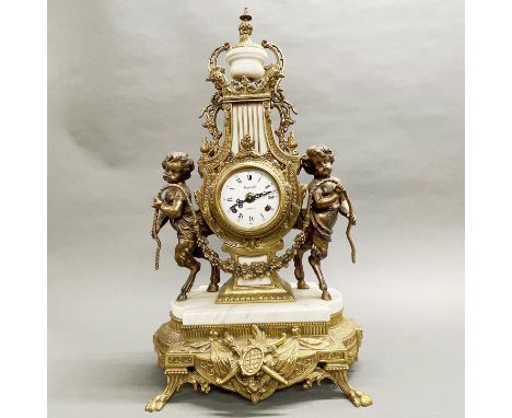 A large brass and marble mantel clock, H. 60cm.