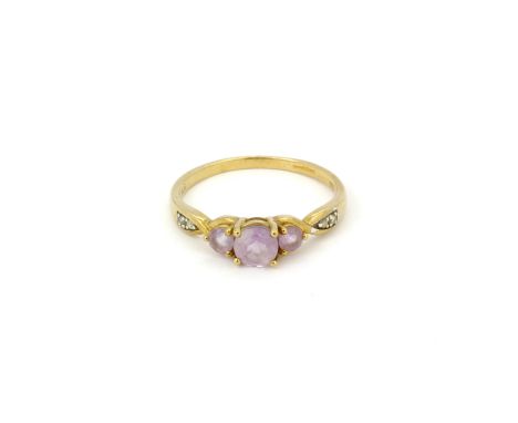 A hallmarked 9ct yellow gold amethyst and diamond ring, (P).