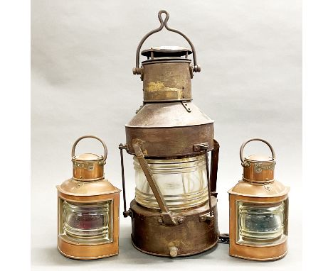 A ship's signalling lamp and two small Port and Starboard lamps.