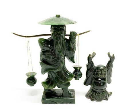 A mid 20thC Chinese carved spinach jade figure of a fisherman, H. 17cm. Together with a spinach jade happy Buddha.