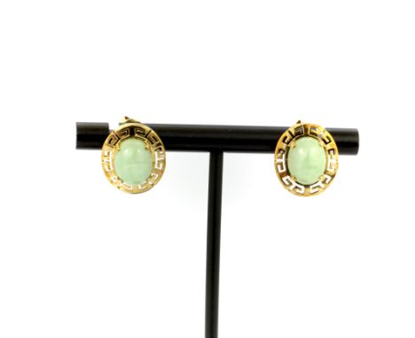 A pair of 9ct yellow gold jade set stud earrings, L. 2cm.
