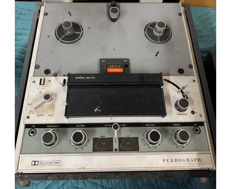 A Ferrograph vintage reel to reel tape recorder.