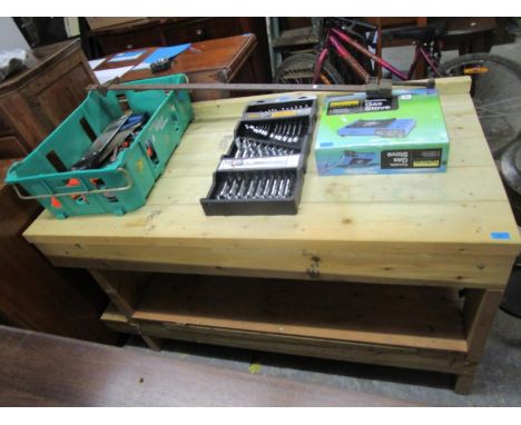 A wooden slatted two tier work bench and a miscellaneous selection of tools to include a boxed Halfords gas stone 