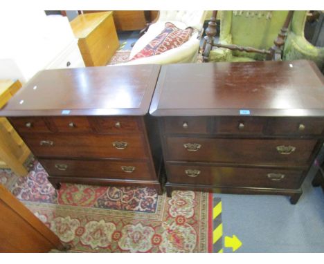 A pair of Stagg mahogany low chests of drawers, three short drawers above two long drawers on bracket feet, 28 x 32 x 18 2/8"