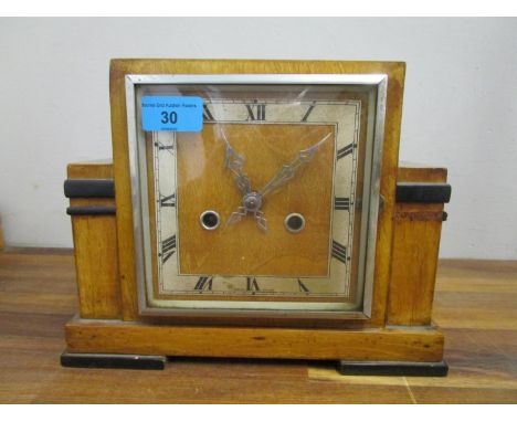 A 1930s Enfield walnut cased with ebonized highlights, 8 day mantle clock, striking on a gong, with key and pendulum 