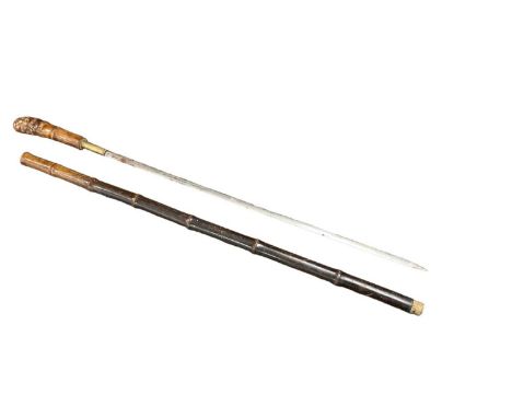 Victorian sword stick with straight double edged blade with bamboo grip and shaft. The blade 58.2cm long, 88cm overall