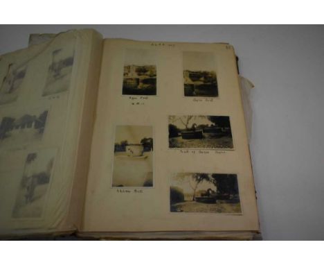 1920s photographs in album including Quetta, India views, people, elephant rides, ox and timber carts, rivers, military sport