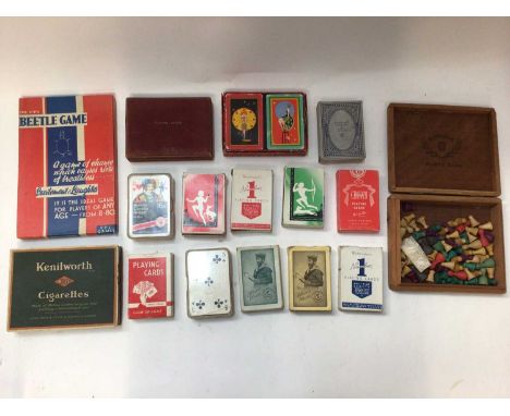 Collection of vintage playing cards and counters
