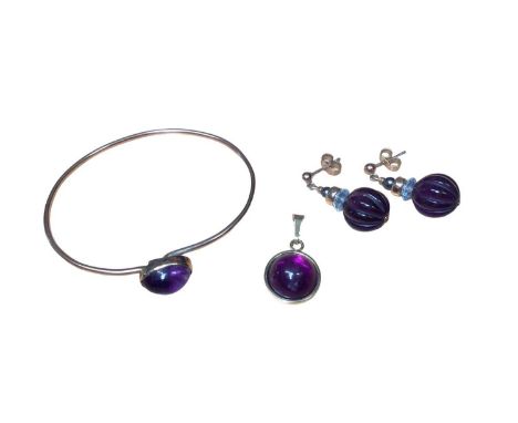 Pair of 9ct gold carved amethyst, aquamarine and grey pearl pendant earrings, yellow metal (333) mounted purple cabochon pend