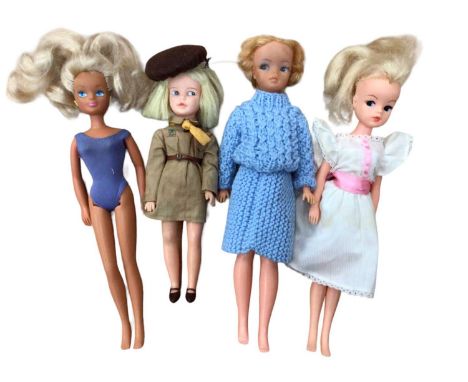 1960s Sindy's sister Patch in Brownie uniform plus two Sindys 033055x and 87-91, one other teenage doll and some clothing.
