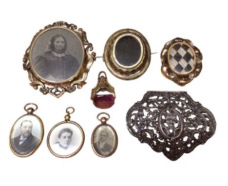 Victorian brooch with rotating glazed panel containing a portrait photograph and hairwork design to reverse, two other simila