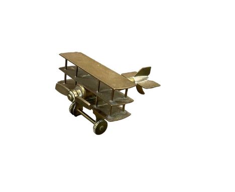 First World War period Trench model of a triplane fashioned from a bullet, approximately 8.5cm in length.