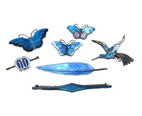 Group of enamelled brooches including a David Anderson silver and enamel butterfly brooch, two other similar Norweigan silver