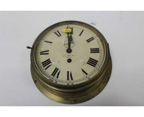 J.W. Benson, London, a brass bulkhead clock, white enamel dial, the case 27cm diameterThe clock does not run, it appears to b