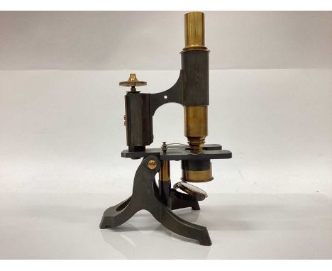 Early 20th century brass microscope, 26cm high, with lenses in fitted box
