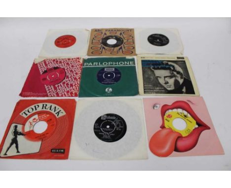 Three vintage blue cases of single records and EPs including Buddy Holly, Eddie Cochran, John Mayall's Blues Breakers, B. B. 