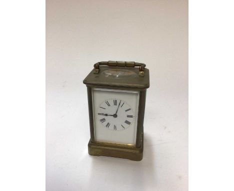 Brass cased carriage clock with enamel dial, 14cm high