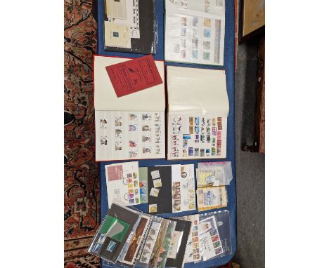 THREE ALBUM OF BRITISH SPECIAL ISSUE AND COMMEMORATIVE POSTAGE STAMPS, SOME FIRST DAY COVERS, A PENNY BLACK AND A 2D BLUE. 