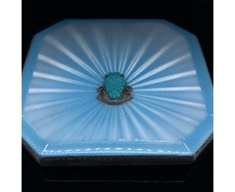 A HALLMARKED SILVER AND GUILLOCHE ENAMEL POWDER COMPACT. THE FRONT WITH MARCASITE AND HARDSTONE CARVING APPLIQUE. DATED 1937,