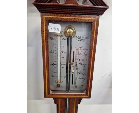 A RUSSELL OF NORFOLK MAHOGANY STICK BAROMETER WITH AN ALCOHOL TO ONE SIDE OF THE SILVERED DIAL THE SHOW COLUMN OF MERCURY WIT