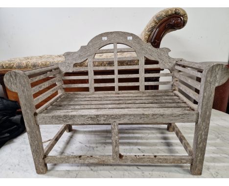 A VINTAGE TEAK CHILD SIZE GARDEN BENCH OF LUTYENS DESIGN