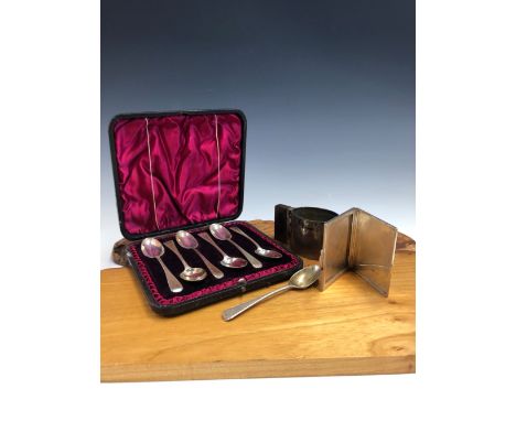 A SILVER CREAM JUG WITH A ROSEWOOD HANDLE, LONDON 1979, A SILVER CARD CASE, LONDON 1979, A CASED SET OF SIX BRIGHT CUT TEA SP