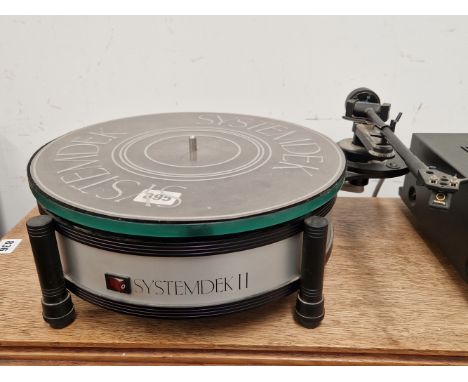 A RARE 1980'S SYSTEM DEK II SPRUNG CHASSIS RECORD TURNTABLE. TOGETHER WITH A NAD SERIES 20 AMPLIFIER.