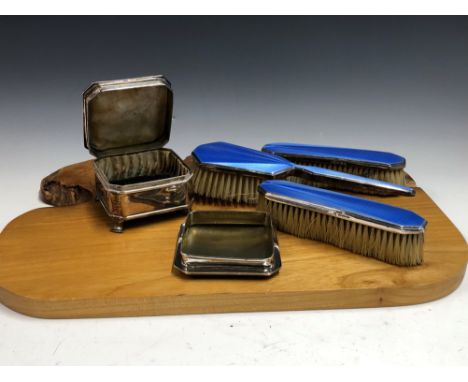 A BLUE ENAMELLED SILVER PART DRESSING TABLE SET BY BARKER BROTHERS, BIRMINGHAM 1930/1, COMPRISING: A RING BOX, A COVER, A HAI