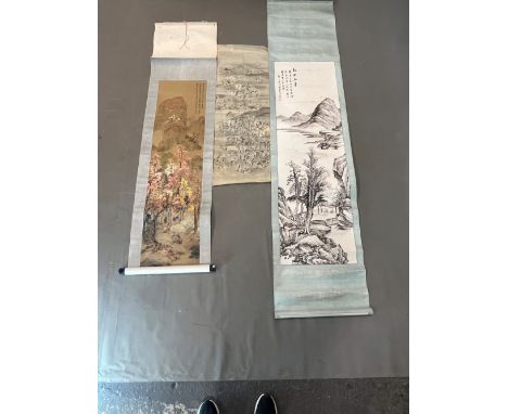 A CHINESE SCROLL DEPICTING FIGURES ENJOYING SPRING BLOSSOMS.   125 x 32.5cms. A BLACK AND WHITE SCROLL DEPICTING FIGURES UNDE