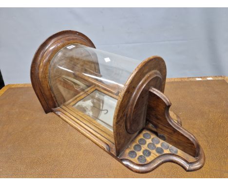 AN EARLY 20th C. OAK WALL MOUNTING SPORTS TROPHY CASE, THE HALF ROUND GLAZED TOP BACKED BY A MIRRORED DOOR ABOVE DATED SILVER