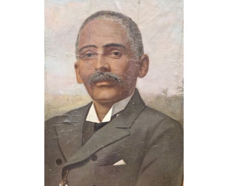 LATE 19th C. SCHOOL, HEAD AND SHOULDERS PORTRAIT OF A MAN WEARING A WHITE METAL CRUCIFORM MEDALLION AT THE NECK OF HIS BLACK 