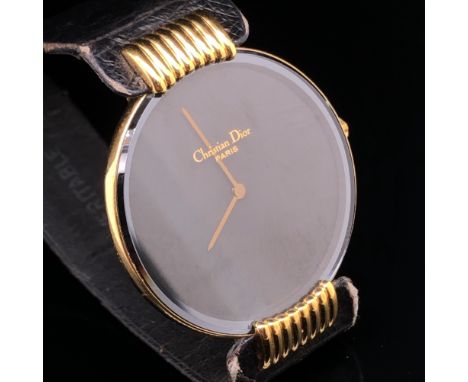 A CHRISTIAN DIOR PARIS BAGHEERA, BLACK MOON DRESS WATCH. REFERENCE 47 15 03-2, 117217 COMPLETE WITH A ORIGINAL BLACK LEATHER 