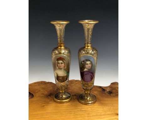 A PAIR OF 19TH CENTURY BOHEMIAN GLASS SLENDER VASES EACH WITH FOLIATE GILT DECORATION CENTRED WITH ENAMELLED PORTRAIT PANELS 