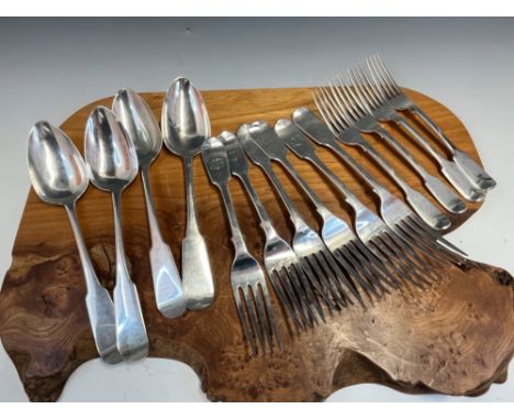 A HARLEQUIN SET OF FIDDLE PATTERN CUTLERY: FOUR TABLE SPOONS BY J G, EDINBURGH 1818, SIX VARIOUS 19th C. TABLE FORKS AND FOUR