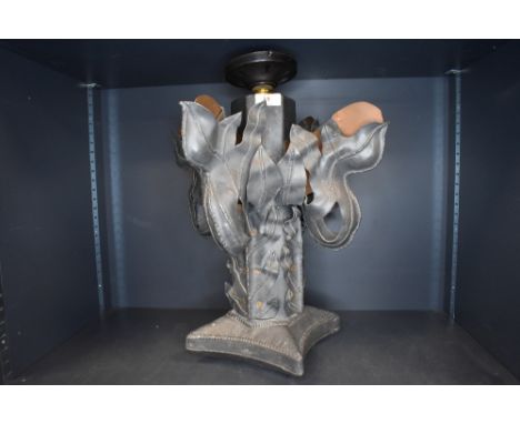 A copper and lead lamp having arts and crafts styling.