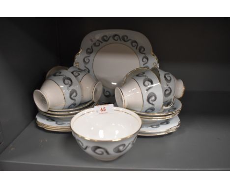 A selection of vintage Windsor bone china including cake plate, cups, saucers and side plates having blue band on white groun
