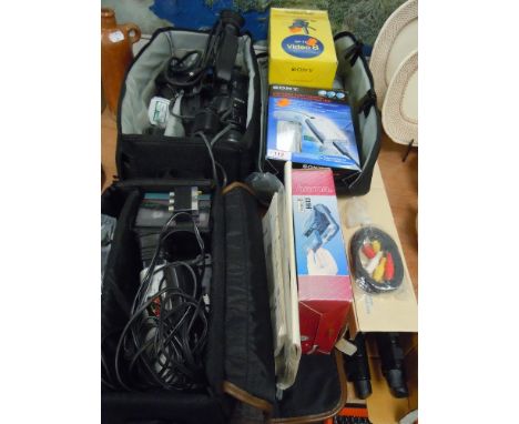 A selection of photographic equipment and similar cameras including boxed Canon Snappy EZ Ferrania and Kodak Instamatic