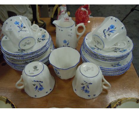 A selection of art deco tea cups and saucers and cake plates by Victoria