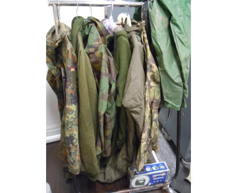 A selection of ex army or military jackets mostly jungle camouflage approx six jackets