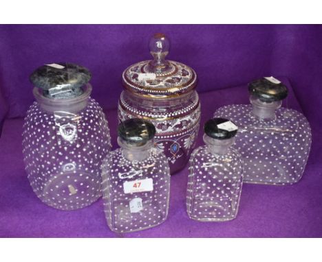 A collection of vintage jars,bottles/decanters having enamel detailing throughout.