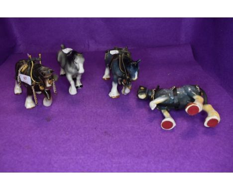 Four ceramic studies of Shire Horses, small sizes with harnesses to three of them