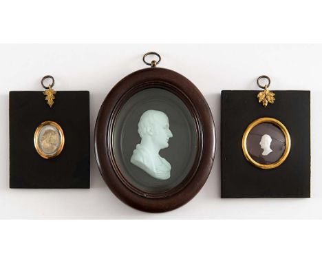 A WHITE GLASS PROFILE PORTRAIT  of Rev. Dr. Maltby, Bishop of Durham inscribed 1817, and signed Henning; 7 cms in wood frame,