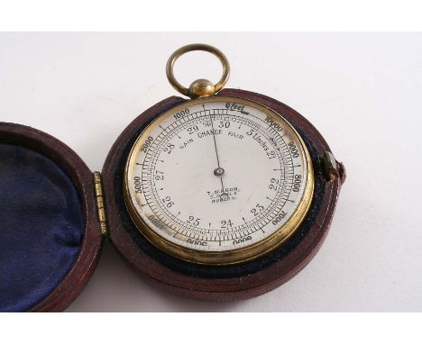 A LATE VICTORIAN GILT METAL POCKET ANEROID BAROMETER with a silvered dial and adjustable outer ring, the dial signed "T. Maso